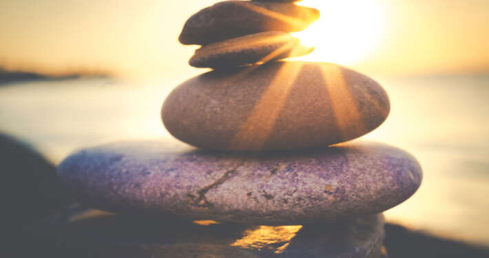 stones piled up with sunset